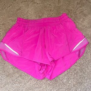 Pink lululemon running shorts